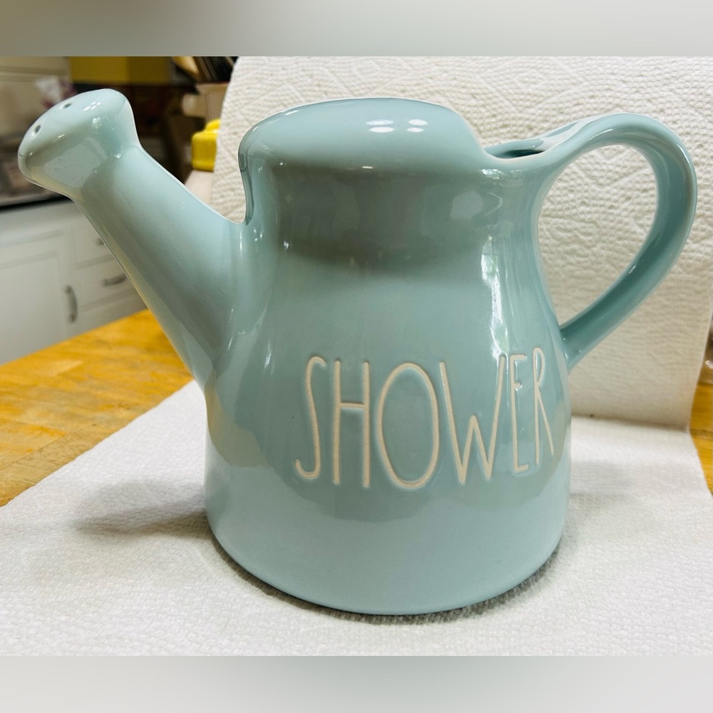 Rae Dunn SHOWER watering pitcher, mint unused condition. Pale blue, 6.5” tall.